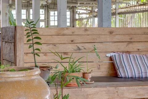 Rustic Eco-Friendly Cafe Interior with Reclaimed Wood Benches and Tiled Floor Фото