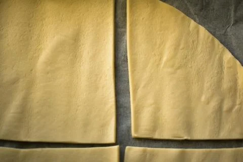 Rustic Eggs and Flour on Dark Wooden Surface Stock Photos