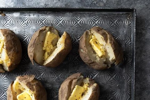 Rustic english jacket potatoes Stock Photos