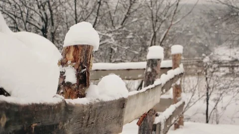 Rustic fence under the snow at winter Stock Footage 70597773