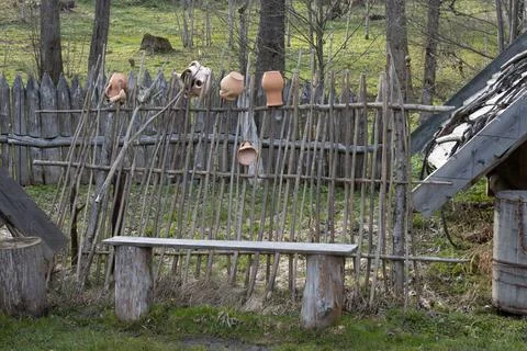 Rustic fence in the yard Stock Photos