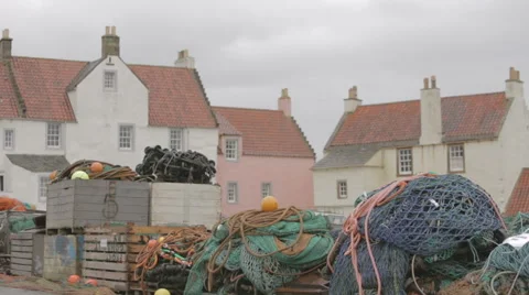 Rustic fishing nets sitting on a Scottish harbour side Stock Footage 58439633