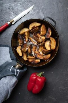 Rustic fried potatoes with salt close-up 스톡 사진