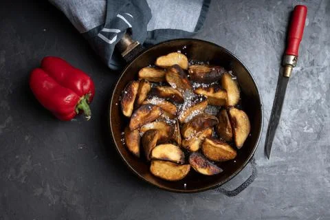 Rustic fried potatoes with salt close-up 스톡 사진