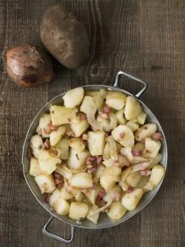 Rustic german pan fried potato bratkartoffeln Stock Photos