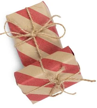 Rustic gift boxes wrapped in craft bown and red paper top view isolated on white Stock Photos