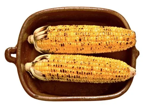 Rustic golden grilled corncob Stock Photos