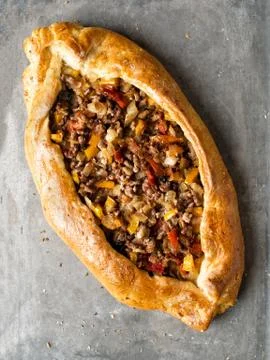 Rustic golden turkish pide bread pizza Stock Photos