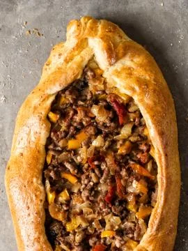 Rustic golden turkish pide bread pizza Stock Photos