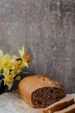 Rustic grain bread with oats, flax seeds, sunflower seeds and sesame seeds on Stock Photos