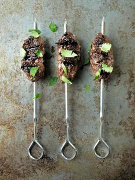 Rustic greek middle eastern lamb kofta Stock Photos