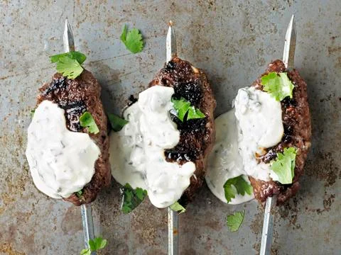 Rustic greek middle eastern lamb kofta Stock Photos