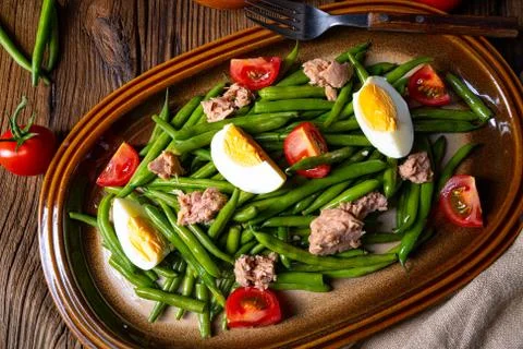 Rustic green bean salad with egg and tuna Stock Photos