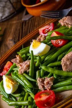 Rustic green bean salad with egg and tuna Stock Photos