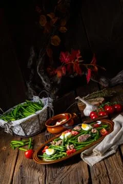 Rustic green bean salad with egg and tuna Stock Photos