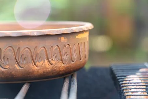Rustic Grill Prep - A Clay Pot Awaits the Feast Stock Photos