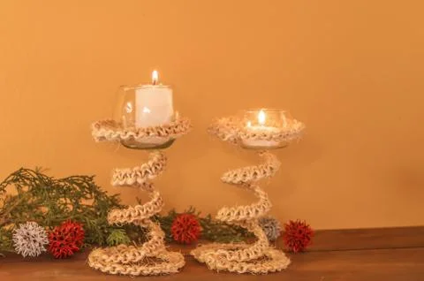 Rustic handmade candlesticks made with recycled materials Stock Photos