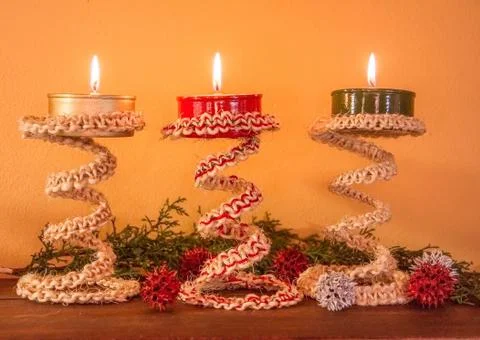 Rustic handmade candlesticks made with recycled materials Stock Photos
