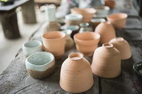 Rustic handmade ceramic clay brown terracotta cups Stock Photos