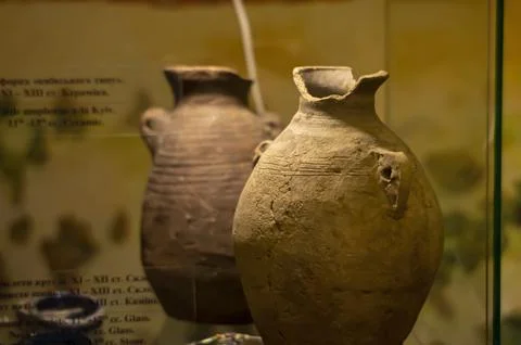 Rustic handmade ceramic clay, brown terracotta jug, souvenirs on display at t Stock Photos