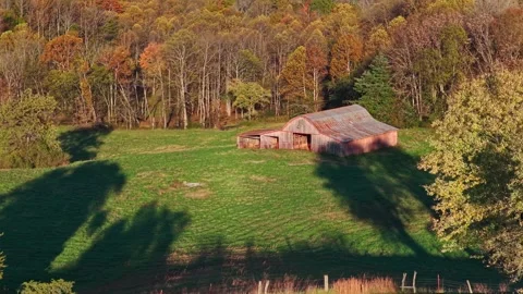 Rustic Harvest Sunset at the Old Barn Stockbeeldmateriaal 324285148