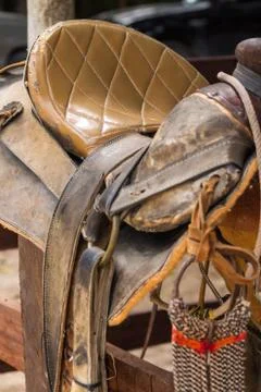 Rustic horse saddle Stock Photos