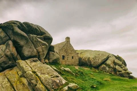 Rustic house between rocks II, brittany Stock Photos