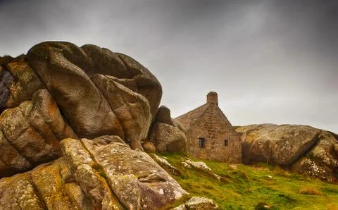Rustic house between rocks III, brittany Stock Photos