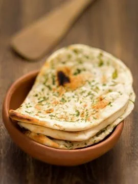 Rustic indian naan bread Stock Photos