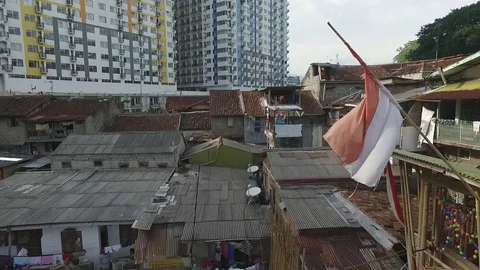 Rustic Indonesia Flag on Settlement Suburban Stock Footage 79948363
