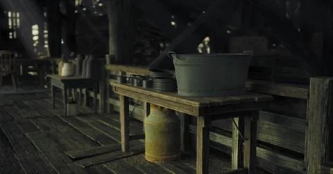 Rustic interior of an old wooden cabin with kitchen supplies at dusk Stock Illustration