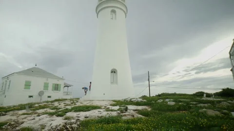 Rustic Island Lighthouse Stock Footage