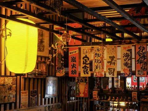 Rustic Japanese lantern in old-style wooden interior of a Japanese Restaurant Stock Photos