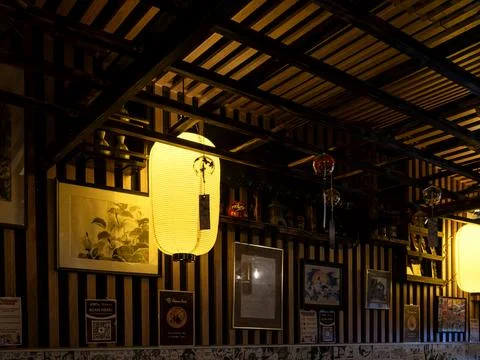 Rustic Japanese lanterns in old-style wooden interior of a Japanese Restaurant Stock Photos