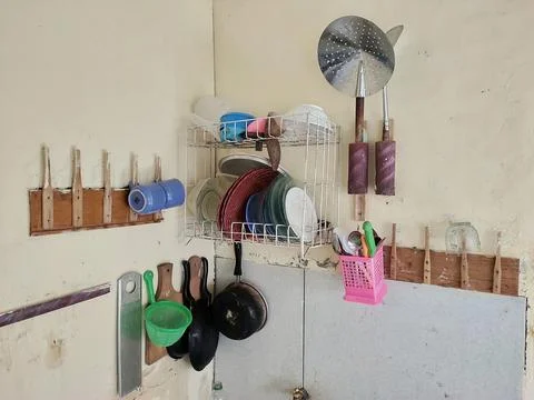 Rustic Kitchen Corner with Utensil Storage Stock Photos