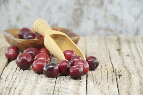 Rustic kitchen scene with fresh cranberries a symbol of health and wellness, Stock Photos
