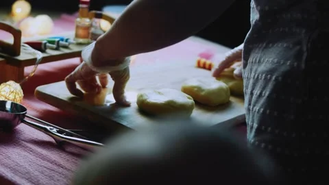 Rustic kitchen sequence of arranging cookie bases in white dishes Stock Footage 342154924