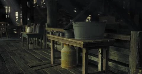 Rustic kitchen setup with wooden tables and cooking utensils near cabin Stock Illustration