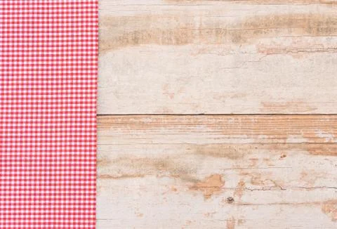 Rustic kitchen table background with red fabric napkin Stock Photos