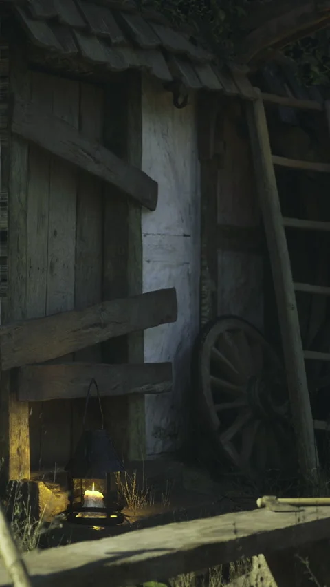 Rustic lantern illuminates old barn door in twilight glow Stock Footage 331829953