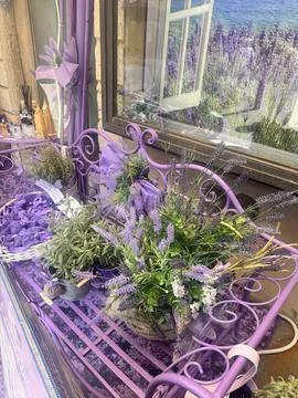 Rustic Lavender Arrangement on Purple Bench. Stock Photos