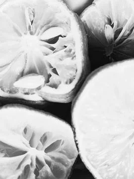 Rustic lemon halves background Stock Photos
