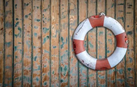 Rustic Lifebuoy On Wall Foto stock