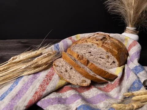 A rustic loaf of sliced bread Stock Photos