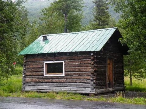 Rustic log cabin in Alaska Stock Photos