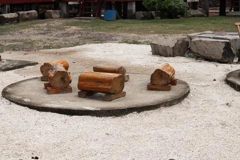 Rustic Log Seating Area in Outdoor Setting for Leisure and Socializing Stock Photos