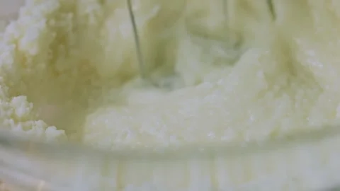 Rustic macro arrangement of smooth cake filling in preparation Stock Footage 342139945