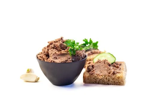 Rustic meat spread with parsley on toasted bread Stock Photos