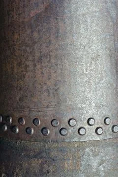 Rustic metal and rivets background vertical photo. Stock-Fotos