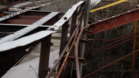 Rustic metal constructions of abandoned plant Stock Footage 88645045